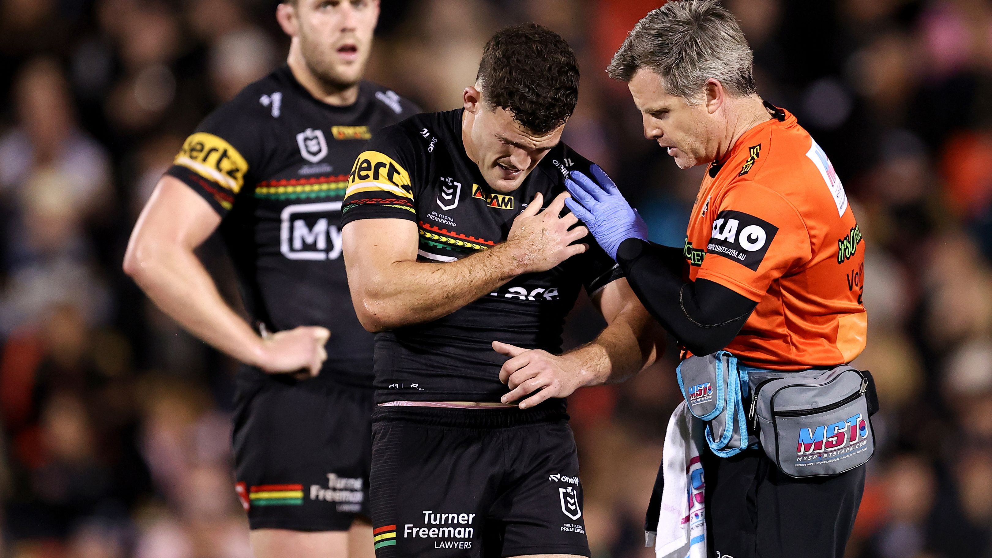 Nathan Cleary of the Panthers holds his shoulder during the round 24 NRL match between Penrith Panthers and Melbourne Storm at BlueBet Stadium, on August 15, 2024, in Penrith, Australia. (Photo by Brendon Thorne/Getty Images)