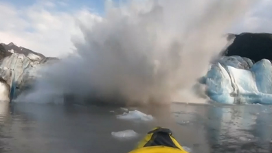A 3-3.7 metre wave of freezing water rushed towards the pair. 