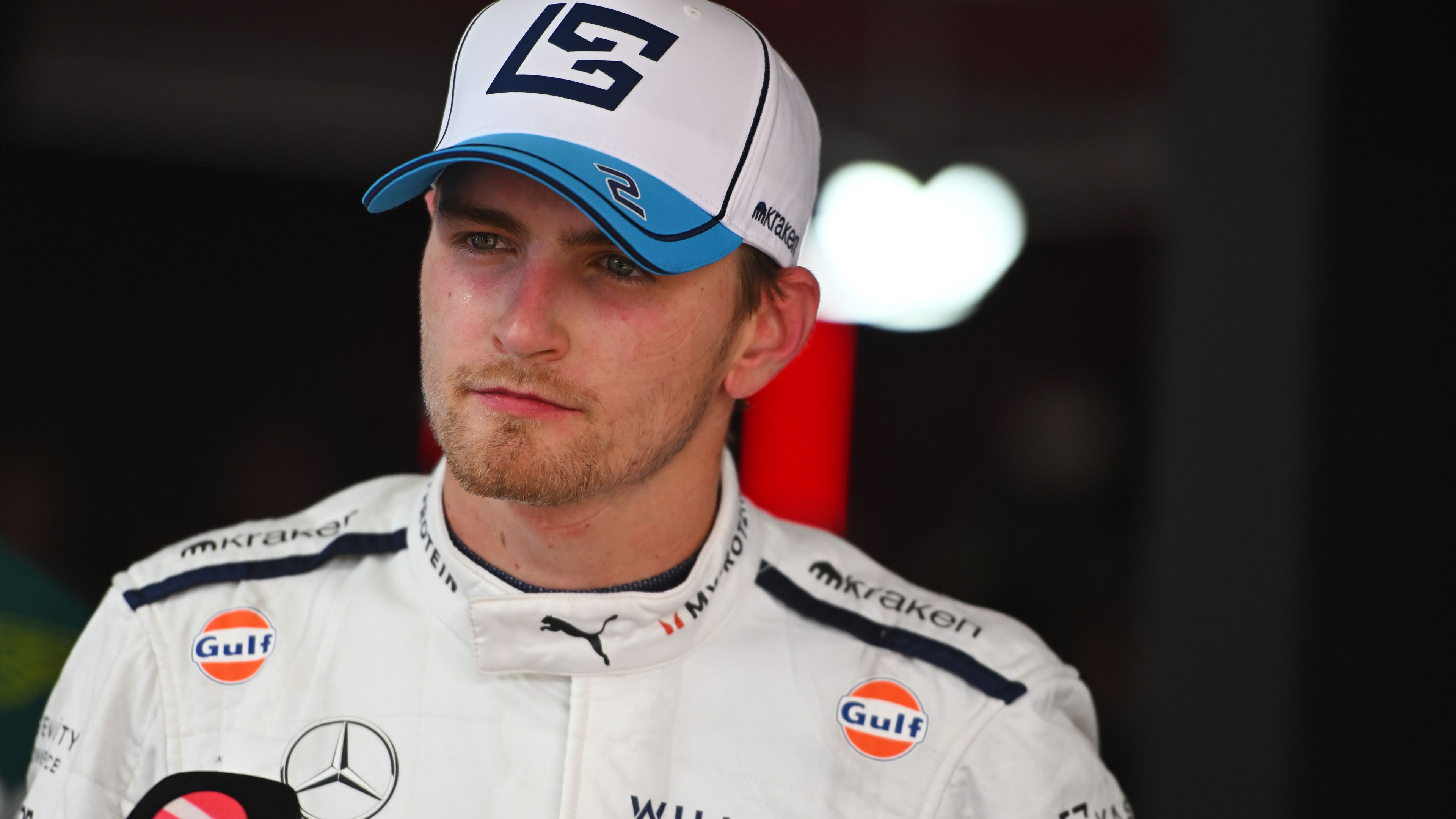 Logan Sargeant of Williams talks to the media in the paddock after Austrian Grand Prix at the Red Bull Ring.