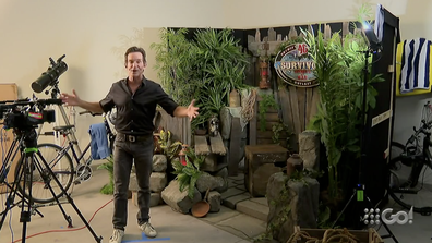 Jeff Probst in his house showing off where he will announce the winner of Survivor Winners at War. 